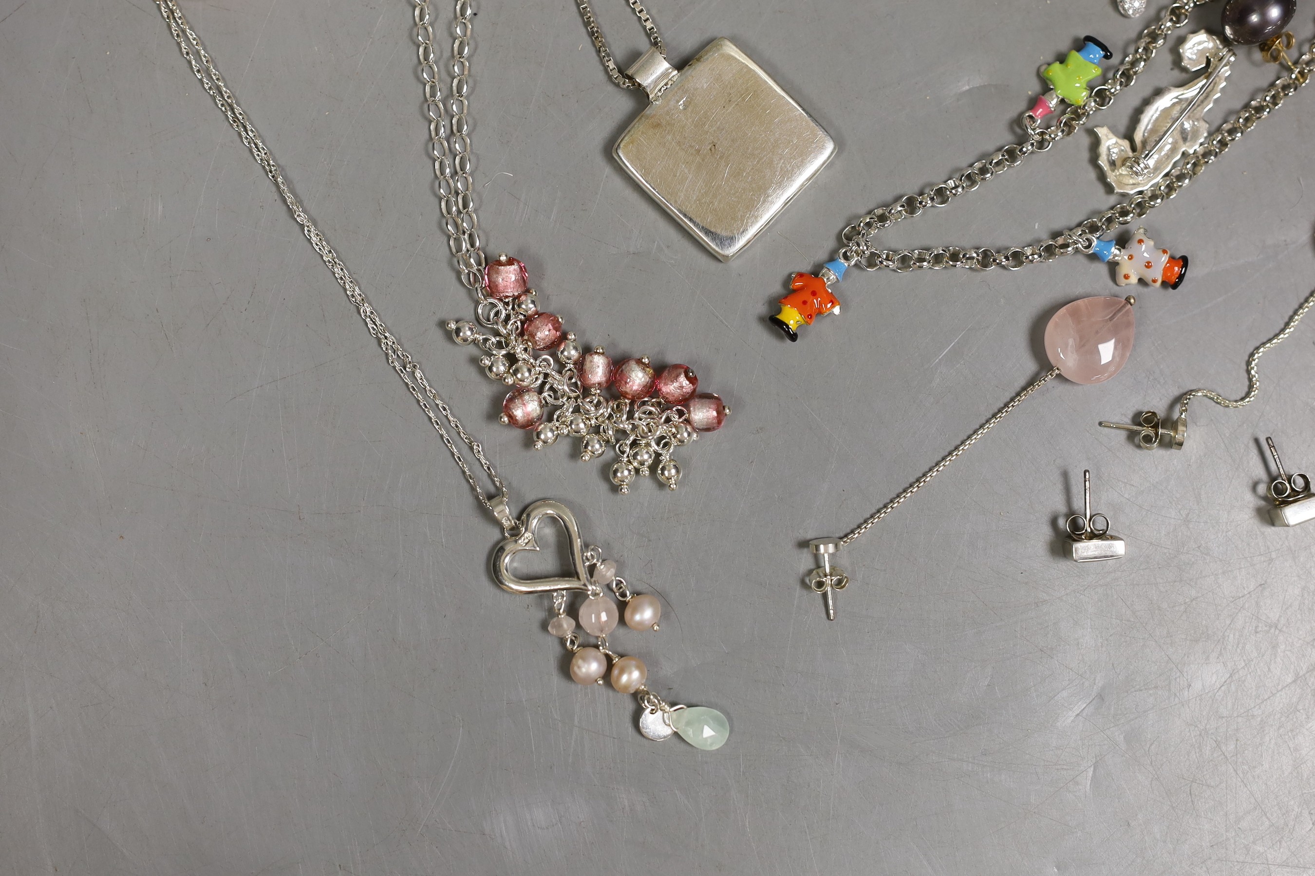 Assorted modern jewellery including four 925, paua shell, freshwater pear and CZ brooches, three assorted pairs of 925 ear studs, a 925 and rose quartz pendant and matching pair of earrings, two pairs of 925 and CZ earri
